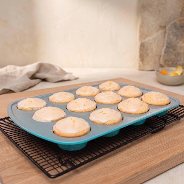 Fluffige Fanta-Muffins mit Zuckerguss und Zitrusabrieb – Pampered Chef® Rezept